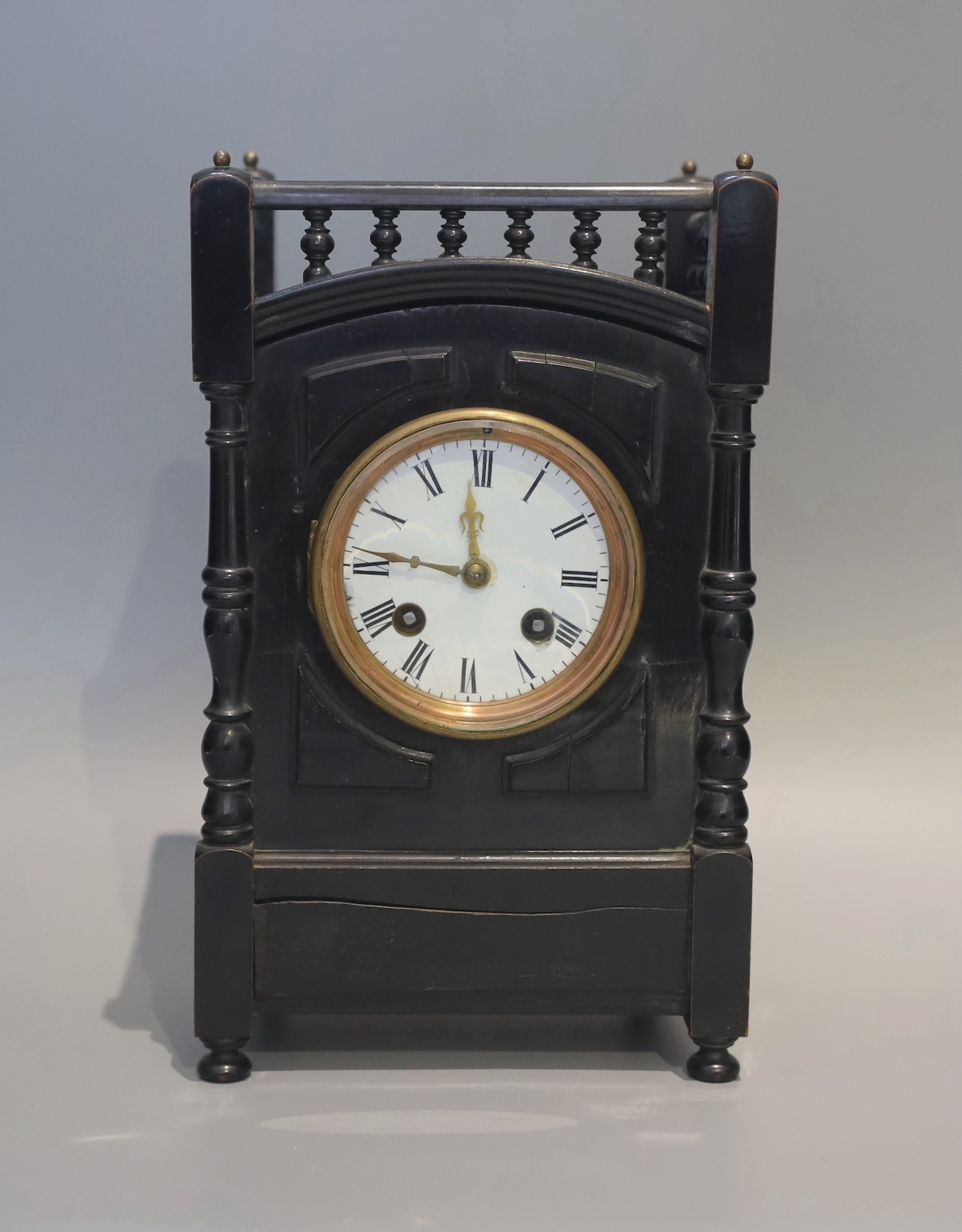 A late Victorian ebonised eight day mantel clock, height 27cm